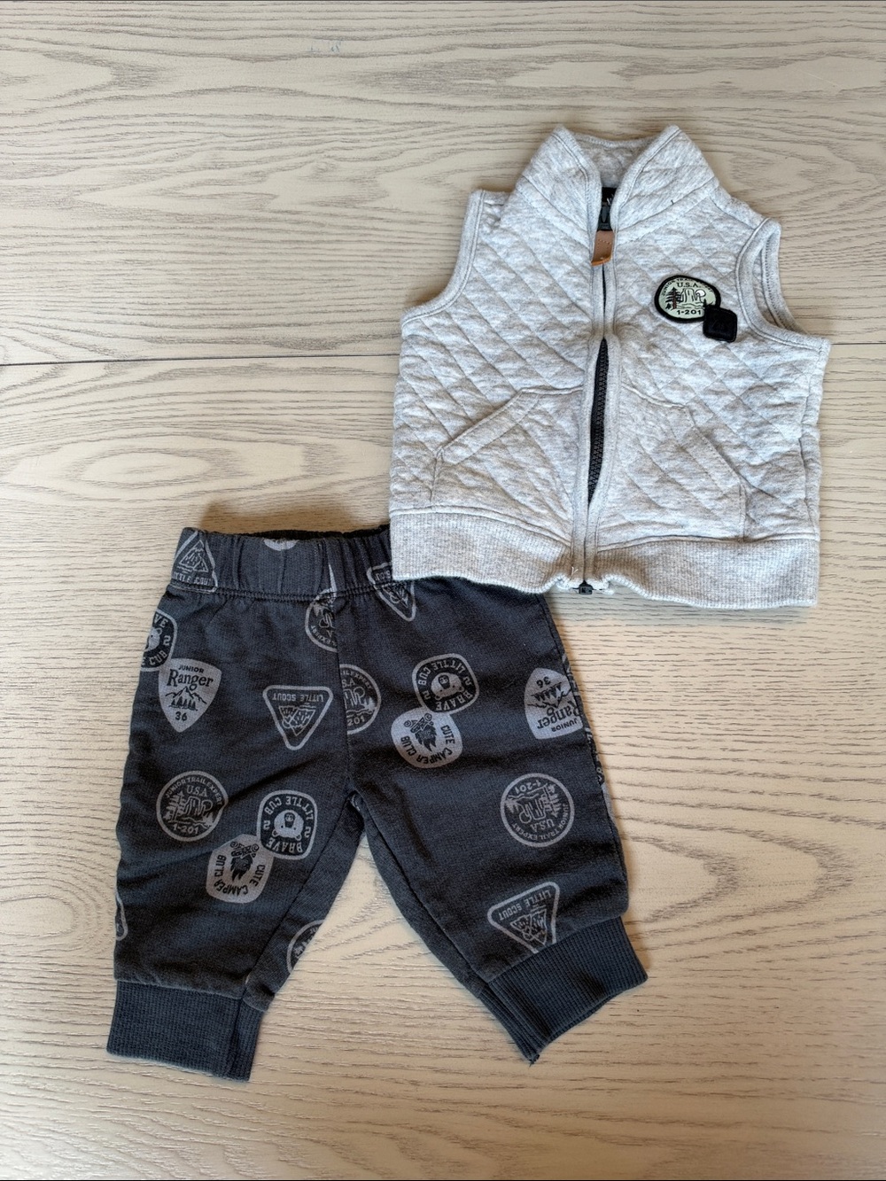 Quilted Light Gray Vest with Black Badge-Print Joggers